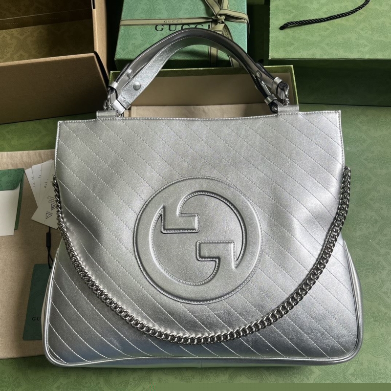 G*u*i top handle bags